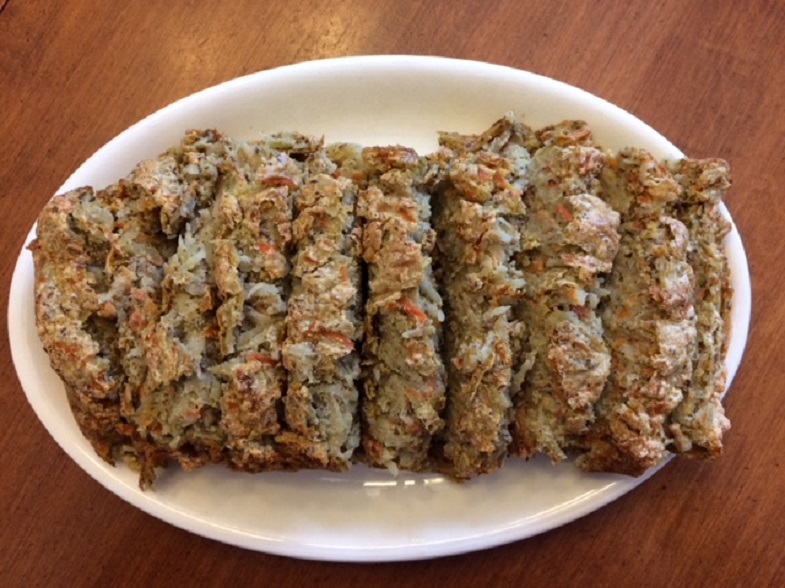 the whole carrot and potato loaf sliced on a plate